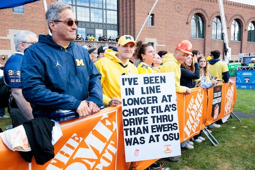 Fans wave signs during an ESPN College GameDay