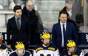 Michigan head coach Brandon Naurato, right, during Michigan’s game against Wisconsin at Yost Ice Arena in Ann Arbor on Friday, Jan. 26, 2024. Michigan defeated Wisconsin 5-1.